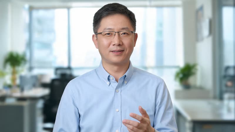 A man presenting in an office